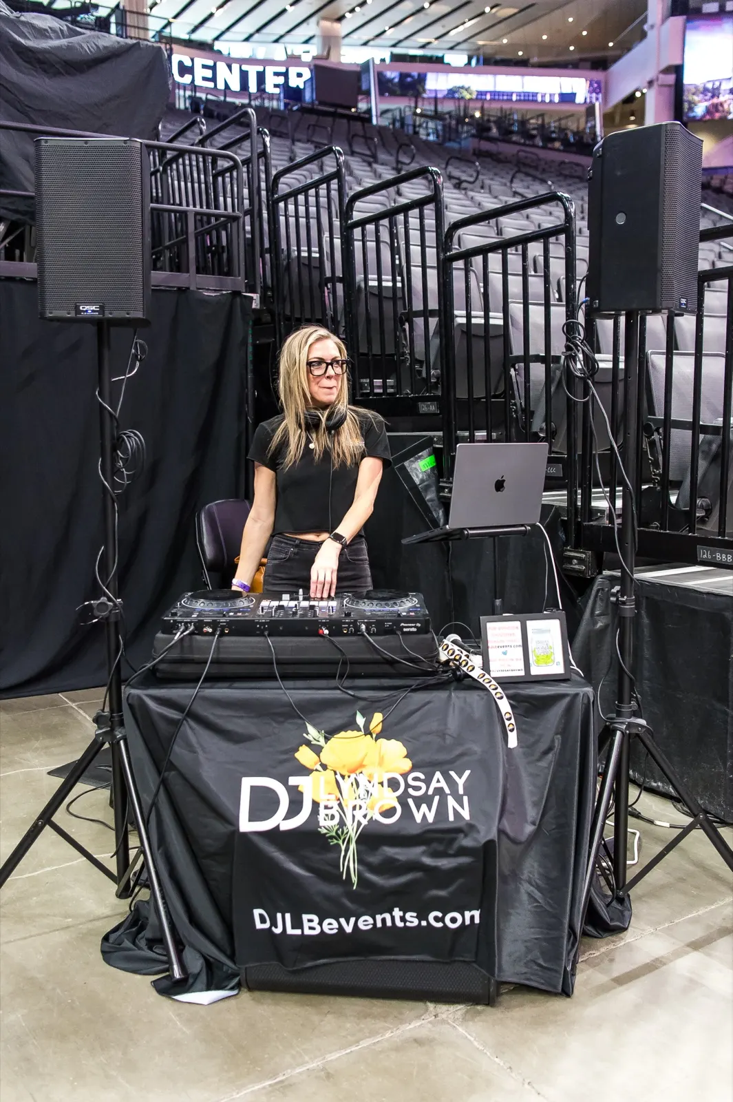 DJ Lyndsay Brown at her branded DJ booth inside Golden 1 Center, Sacramento